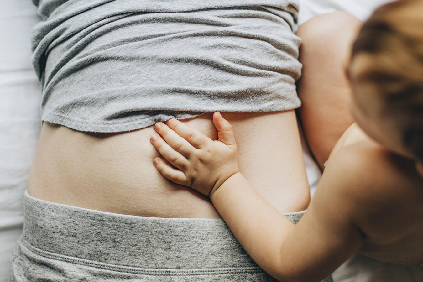 Ciąża na urlopie wychowawczym. Co ze zwolnieniem i zasiłkiem?